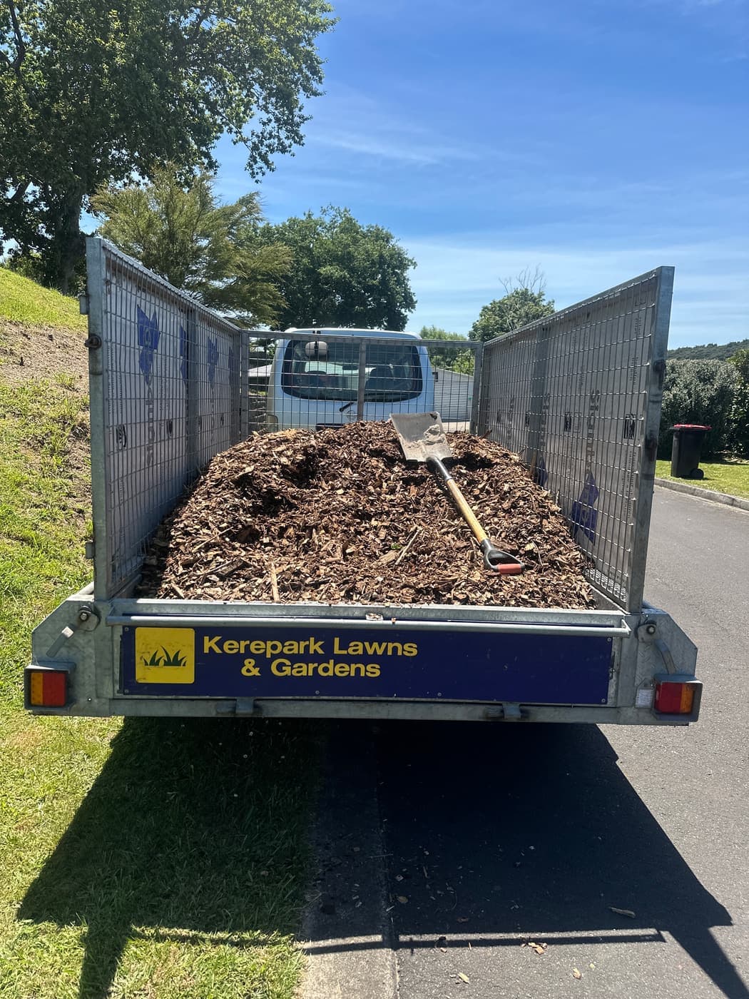 Trailer loaded with green waste