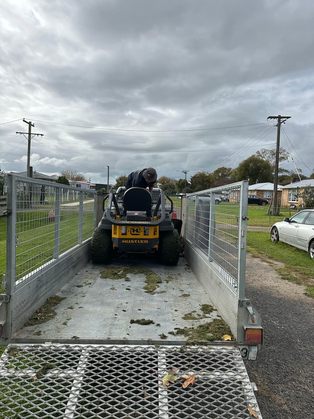 Trailer with ride-on mower