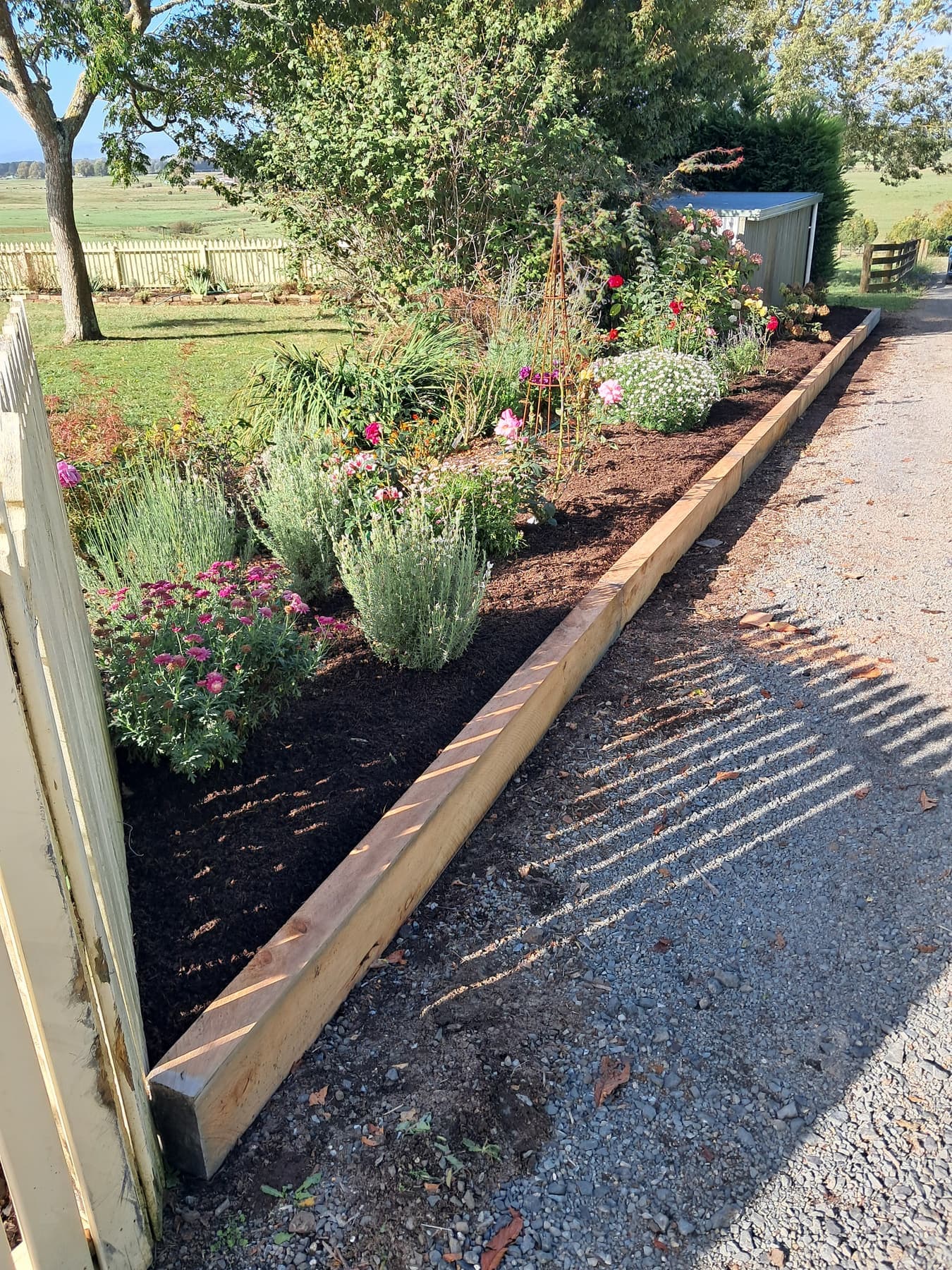 New garden bed, timber edging, gravel path